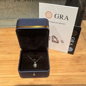 #29 0.8 ct Moissanite swirl circle necklace